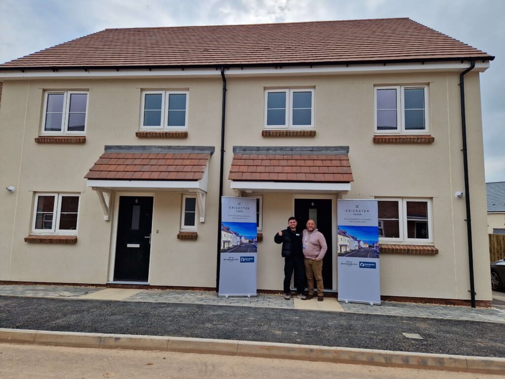 Picture of Homes in Somerset colleagues outside a property in a new development.