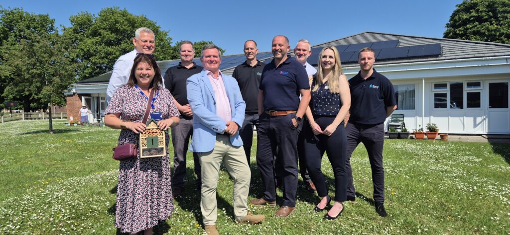 A group of contractors outside Dunwear House