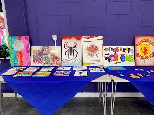 Posters created by children on display.